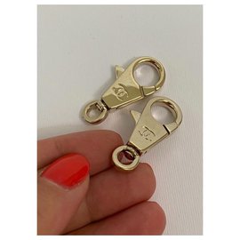 Chanel-2 Chanel gold charm carabiners hooks-Golden