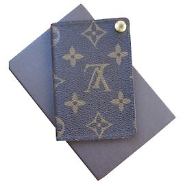 Louis Vuitton Monogram canvas business card holder. Brown