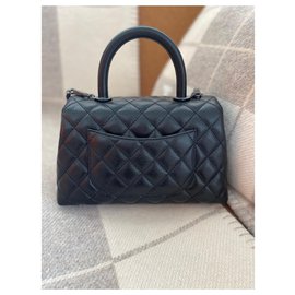 Chanel-Handbags-Black
