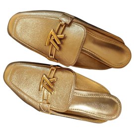 Autre Marque-Sandálias de couro ouro Louis Vuitton Mules-Dourado