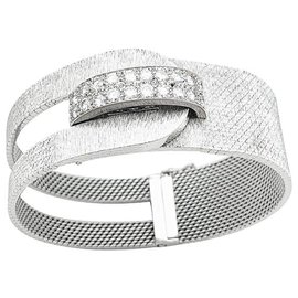 Christian Louboutin-Vintage Uti watch white gold and diamonds.-Other