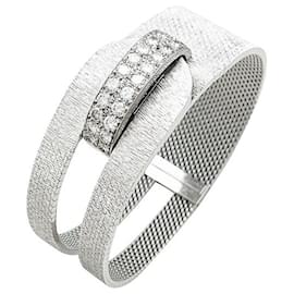 Christian Louboutin-Vintage Uti watch white gold and diamonds.-Other
