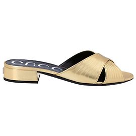 Gucci Chanclas de cuero Dorado Metálico