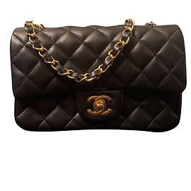 Chanel Mini bolsa de pele de cordeiro preta Preto