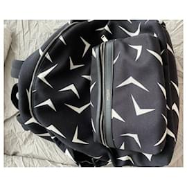 Yves Saint Laurent Sac à dos en toile imprimée Boomerang noir Saint Laurent Noir Blanc
