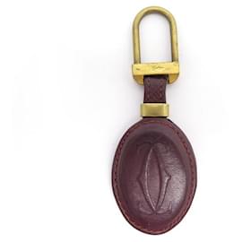 Cartier-MUST DE CARTIER KEYCHAIN IN BORDEAUX LEATHER + KEY RING LEATHER BOX-Dark red