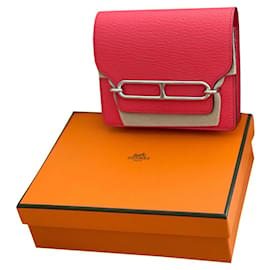 Hermès-Portefeuille slim roulis Hermès-Rose