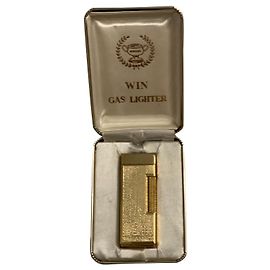 Autre Marque Encendedor en placa de oro Gold hardware
