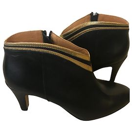 Petite Mendigote Black and gold boots Black Golden