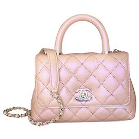Chanel Cadena de plata de caviar rosa claro iridiscente con mango de coco mini Rosa