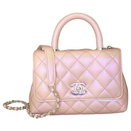 Chanel-Mini Coco Griff Schillernde Hellrosa Kaviar Silberkette-Pink
