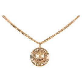 Collier pendentif rond en or MCM Doré