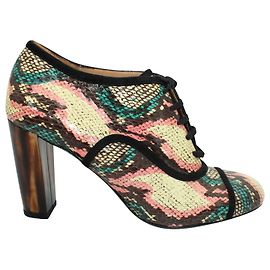 Dries Van Noten Stivali stringati in pelle di serpente colorati Altro