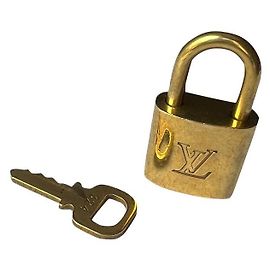 Ciondolo per borsa Louis Vuitton Lucchetto Oro Metallo D'oro
