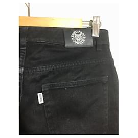 Kenzo-Jeans Kenzo con risvolto logato bianco e nero-Nero