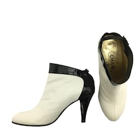 Chanel-Chanel ankle boots in white leather with black patent trim-White