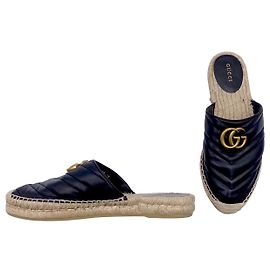 Espadrillas mule Gucci in pelle nera con Gs lined foderate oro Nero