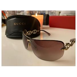 Gucci-Des lunettes de soleil-Doré,Bronze,Caramel,Cuivre