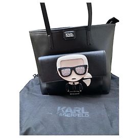 Excelente bolsa Karl Lagerfeld, efígie de Karl Preto