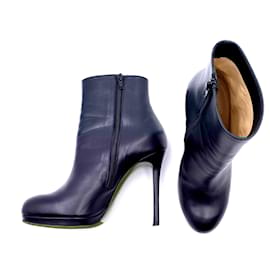 Christian Louboutin-Louboutin platform ankle boots in black leather-Black