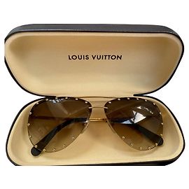 Louis Vuitton La fiesta Marrón claro