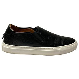 Baskets basses Givenchy Star Emboss en cuir noir Noir