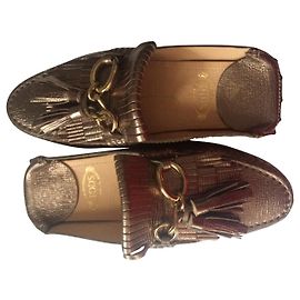 Tod's Mules Metallic Copper Gold hardware