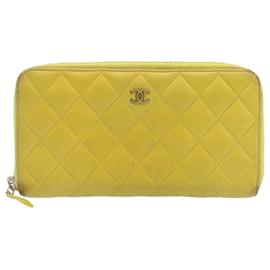 Chanel-CHANEL Matelasse Zip Around Wallet Lamb Skin Yellow CC Auth 26319-Yellow