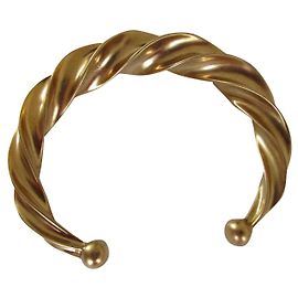 Nina Ricci Bracelet torsade. Doré
