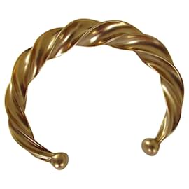 Nina Ricci-Armband Torsade, Goldteller.-Golden