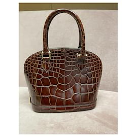 Louis Vuitton-Vintage Alma BB Louis Vuitton Mini handbag in brown crocodile leather. Strap-Dark brown