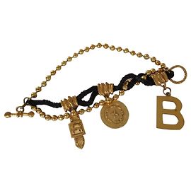 Balenciaga bracciale con ciondoli oro e nero D'oro