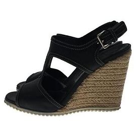 Prada Mulas de cuña Negro