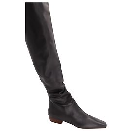 The Row Slouch Flat Boot in Black Leather Black