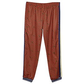 Gucci Trainingshose mit Diagonalstreifen aus rotem Polyester Rot