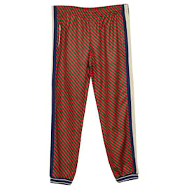Gucci-Gucci Pantalon de survêtement à rayures diagonales en polyester rouge-Rouge