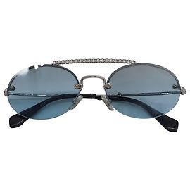 Miu Miu Ovale Sonnenbrille mit Strassstab aus hellblauem Metall Blau Hellblau