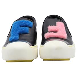 Fendi-Fendi FF Shearling Fur Slip-On Sneaker en cuero negro-Negro