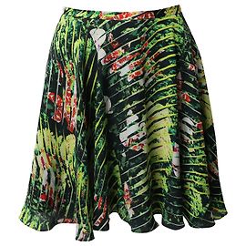 Minifalda plisada con estampado de selva en seda verde de Kenzo Verde