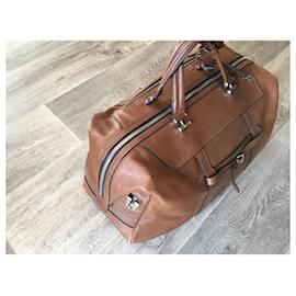 Autre Marque-shoulder bag. TUMI. Limited edition-Light brown