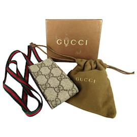 Neceser Gucci con bandolera Beige