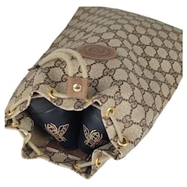 bolso monograma multiusos gucci Beige