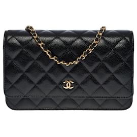 Chanel-Hervorragende Chanel-Geldbörse auf Kettentasche (WOC) Aus schwarzem, gestepptem Kaviarleder, garniture en métal doré-Schwarz