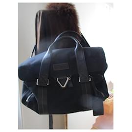 Lancel-Black canvas and leather travel bag.-Black
