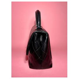 Chanel-Bolso Chanel Vintage de piel de cordero con asa superior.-Negro