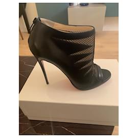 Christian Louboutin-Pair of new black Christian Louboutin heeled ankle boots-Black