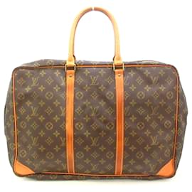 Louis Vuitton-Louis Vuitton Sirius-Brown