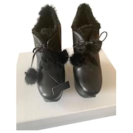 Saint Laurent-Pair of black ankle boots with wedge heel and platform-Black