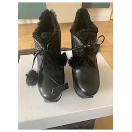 Saint Laurent-Pair of black ankle boots with wedge heel and platform-Black