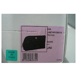 Chanel-CHANEL New asymmetrical black leather case (Avec boîte)-Black
